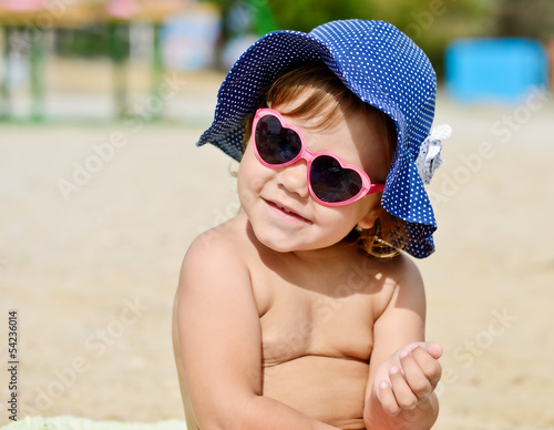 Photo: sweet fashion toddler girl on the beach sweet fashion toddler girl on the beach