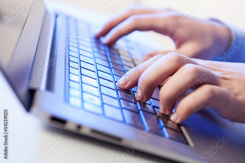 Photo: Click! Hands of a man on keyboard Click! Hands of a man on keyboard