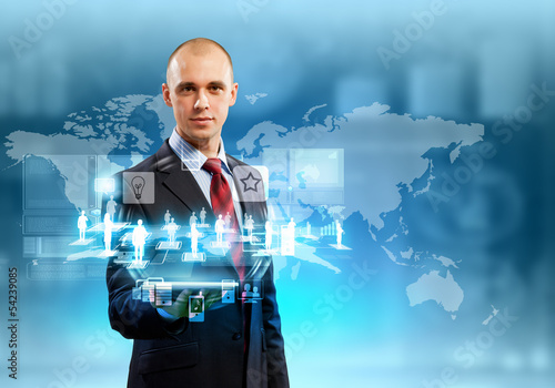 Photo: Businessman with tablet pc Businessman with tablet pc