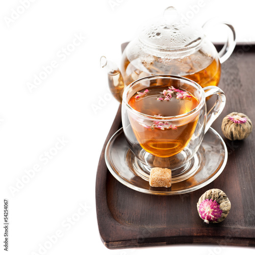 Photo: Green tea in a cup and teapot Green tea in a cup and teapot