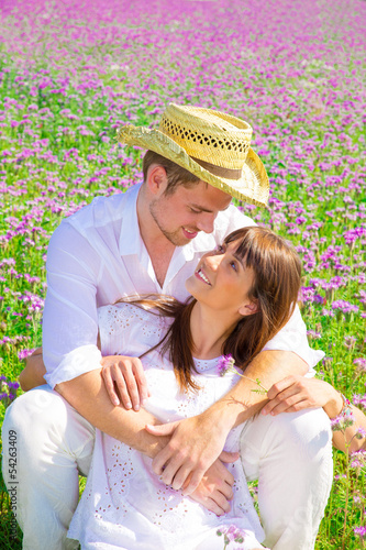 Photo: young family on floral texture young family on floral texture