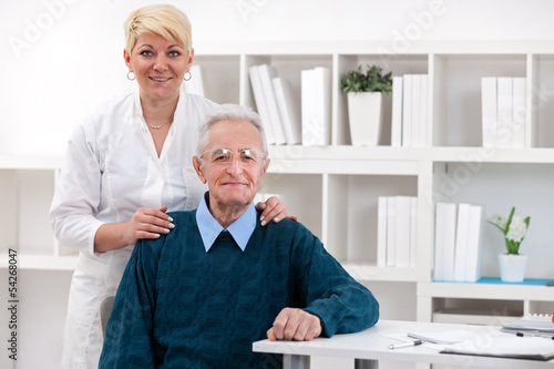 Photo: Old men with nurse Old men with nurse