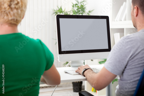 Photo: Two colleagues in office Two colleagues in office