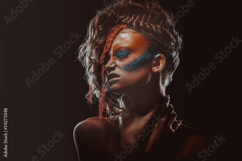 Photo: portrait of a beautiful young woman portrait of a beautiful young woman