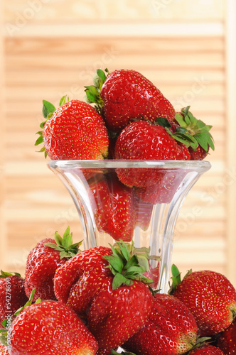 Photo: strawberries in a glass vase strawberries in a glass vase