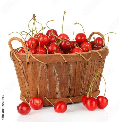Photo: Cherry berries in basket isolated on white Cherry berries in basket isolated on white