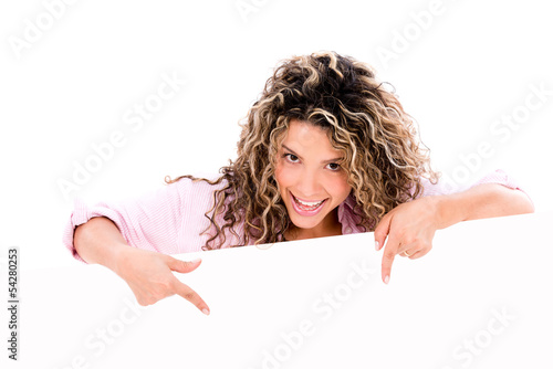Photo: Woman pointing a banner ad Woman pointing a banner ad