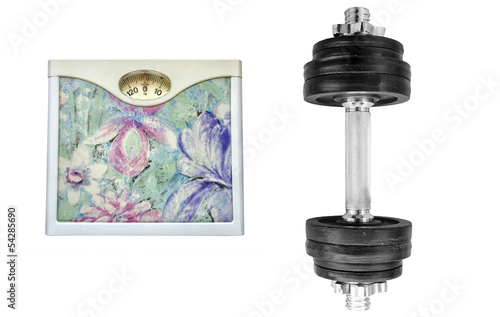 Photo: Weighing machine and dumbbell Weighing machine and dumbbell