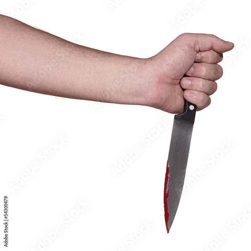 Photo: A knife smeared with blood. A knife smeared with blood.