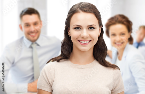 Photo: attractive young businesswoman in office attractive young businesswoman in office