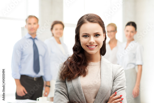 Photo: attractive young businesswoman in office attractive young businesswoman in office
