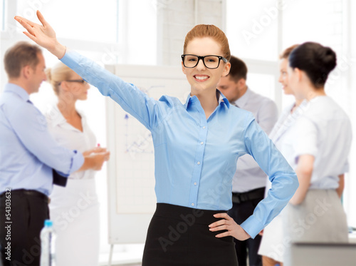 Photo: attractive young businesswoman in office attractive young businesswoman in office