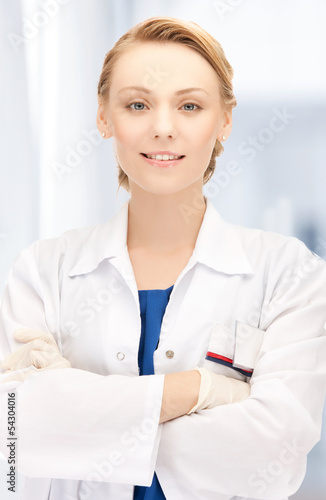 Photo: smiling female doctor in hospital smiling female doctor in hospital