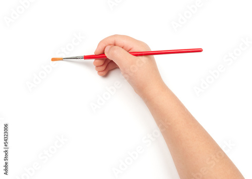 Photo: paintbrush in child hand paintbrush in child hand