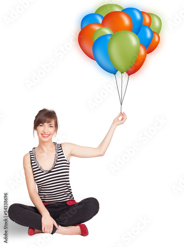 Photo: Young woman holding colorful balloons Young woman holding colorful balloons