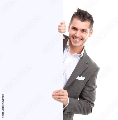 Photo: Happy business man presenting with copy space for your text Happy business man presenting with copy space for your text