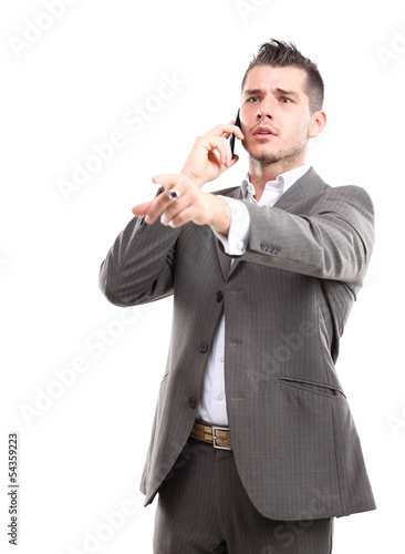 Photo: Portrait of a business man with phone isolated on white Portrait of a business man with phone isolated on white