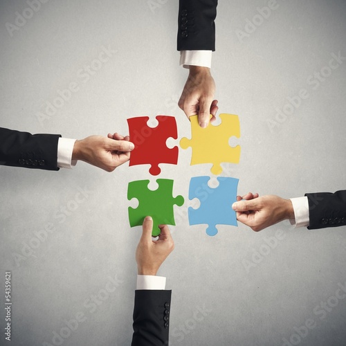 Photo: Teamwork and partnership concept Teamwork and partnership concept