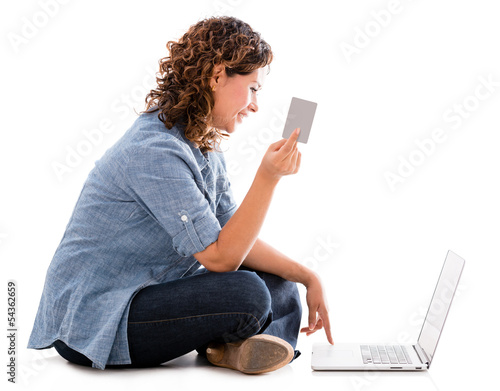 Photo: Woman shopping online Woman shopping online