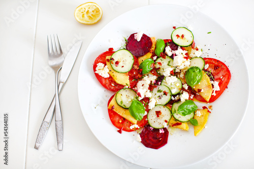 Photo: Summer salad of mango, tomato, beetroot, cucumber and feta Summer salad of mango, tomato, beetroot, cucumber and feta