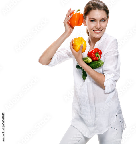 Photo: promo girl holds red and orange paprikas promo girl holds red and orange paprikas