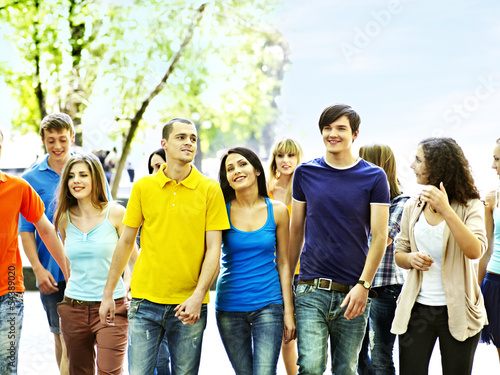 Photo: Group people in summer outdoor. Group people in summer outdoor.