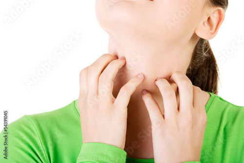 Photo: Young beautiful woman scratching her self. Young beautiful woman scratching her self.