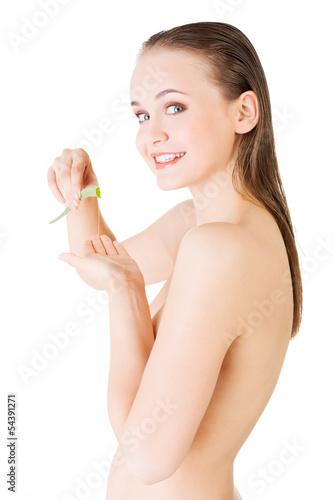 Photo: Woman with aloe vera Woman with aloe vera