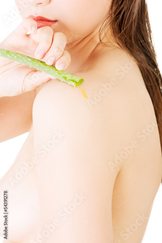 Photo: Woman with aloe vera Woman with aloe vera