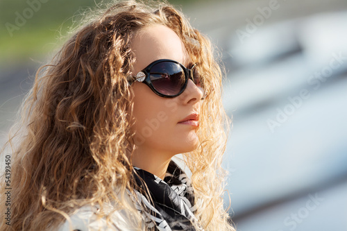 Photo: Beautiful woman in sunglasses Beautiful woman in sunglasses