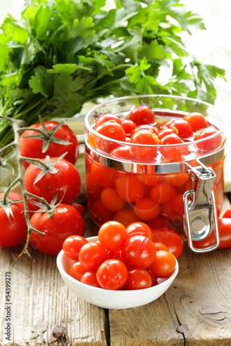 Photo: snack tomatoes pickled with herbs and spices snack tomatoes pickled with herbs and spices