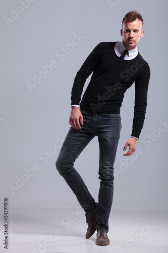 Photo: casual man leaning on a side casual man leaning on a side