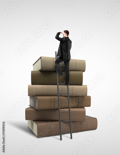 Photo: businessman and books businessman and books