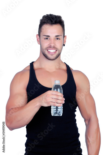 Photo: Handsome guy with muscles after sport drinking Handsome guy with muscles after sport drinking