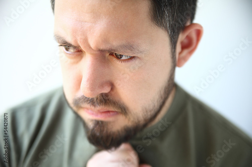Photo: young man with heartburn discomfort young man with heartburn discomfort