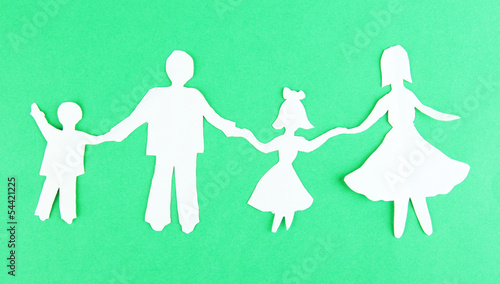 Photo: Paper people on color background Paper people on color background