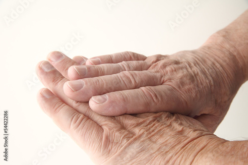 Photo: closeup view of a senior man's aging hands closeup view of a senior man's aging hands