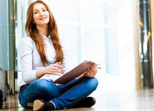 Photo: Young woman in casual Young woman in casual