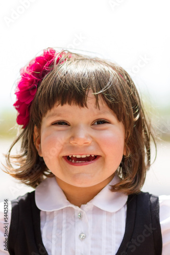 Photo: Portrait of cute little girl with copy space Portrait of cute little girl with copy space