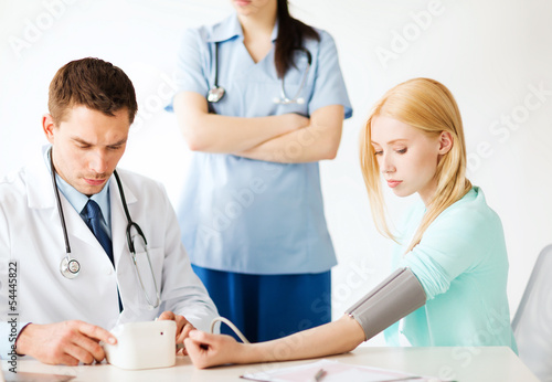 Photo: doctor and patient in hospital doctor and patient in hospital