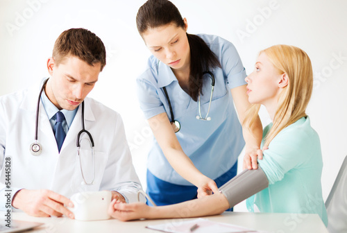 Photo: doctor and patient in hospital doctor and patient in hospital
