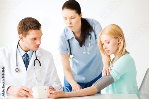 Photo: doctor and patient in hospital doctor and patient in hospital