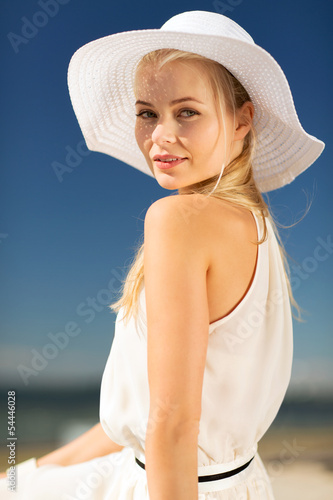 Photo: beautiful woman enjoying summer outdoors beautiful woman enjoying summer outdoors