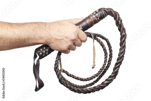 Photo: male hand holding brown leather whip isolated on white backgroun male hand holding brown leather whip isolated on white backgroun