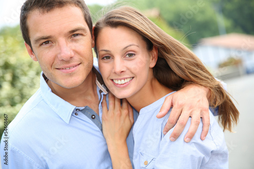 Photo: Portrait of cheerful and lovely couple Portrait of cheerful and lovely couple
