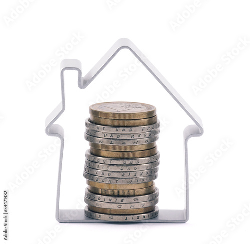Photo: House and stack of euro coins House and stack of euro coins