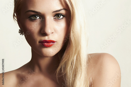 Photo: beautiful blond woman with red lips beautiful blond woman with red lips