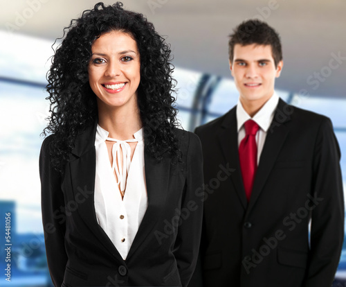 Photo: Two businesspeople in the office Two businesspeople in the office