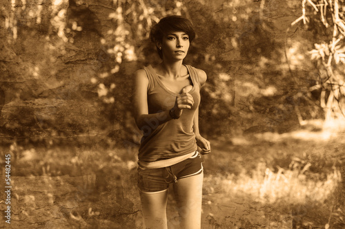 Photo: beautiful healthy brunette young woman athlete running outdoors, beautiful healthy brunette young woman athlete running outdoors,