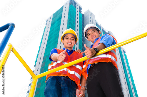 Photo: Asian architect and supervisor on construction site Asian architect and supervisor on construction site